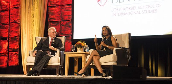 Christopher R. Hill, dean of Josef Korbel School of International Studies and former U.S. ambassador to Iraq, speaks with former U.S. Secretary of State Condoleezza Rice. IPS_Michelle_Obama.jpg