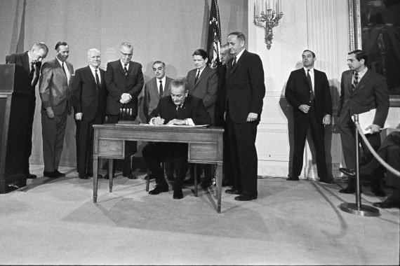 President Lyndon B. Johnson Signing the Public Broadcasting Act at the White House on November 7, 1967. pbs50_570px.jpg