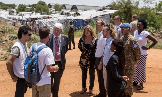Hervé Ladsous (fourth from the left), Under-Secretary-General for UN Peacekeeping Operations, on a visit to Tomping Camp, in Juba, Republic of South Sudan, where the UN was protecting roughly 20,000 civilians displaced by fighting; UN Photo/Isaac Billly un_peacebuilding_570px.jpg